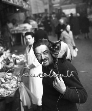 French artist at the market, Paris, 1953